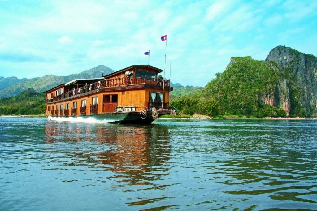 LAOS CRUISING PRIVATE TOUR TO GOLDEN TRIANGLE LAOS CRUISING PRIVATE TOUR TO GOLDEN TRIANGLE